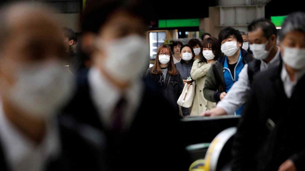 Japanese wearing masks for protection against the coronavirus