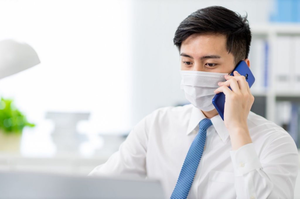 Wearing a mask while on the phone